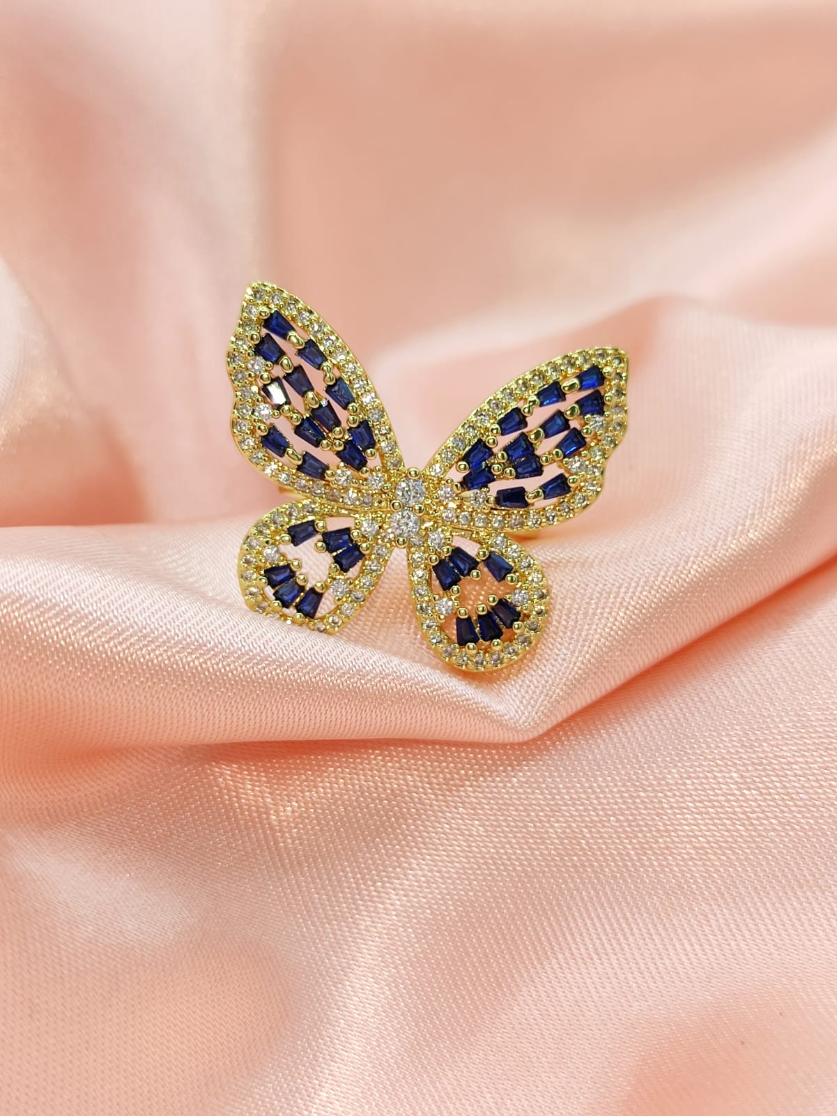 Anillo ajustable mariposa y brillo azul