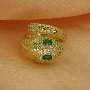anillo maxi cobra ajustable dorado con brillos y piedras verdes