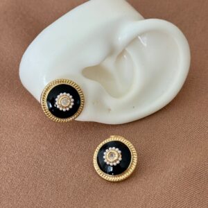 topo redondo negro con dorado