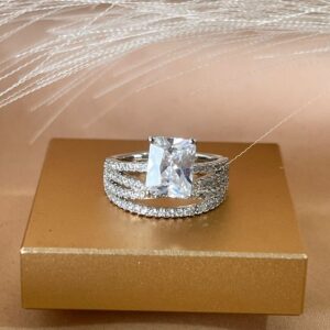 Anillo ajustable plateado tres linea con brillo y cristal