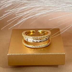 Anillo ajustable dorado  tres línea de tenis y zircones con brillo
