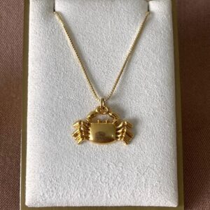 Collar de cangrejo dorado