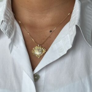 Collar de corazon con espina dorado con brillo