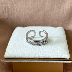Anillo plateado tres líneas con zircones en rosa