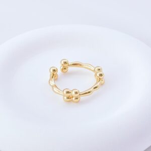 Anillo ajustable con balines y texturas