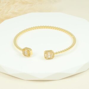 Brazalete dorado con detalle de cristal