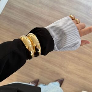 Brazalete dorado liso en baño de oro