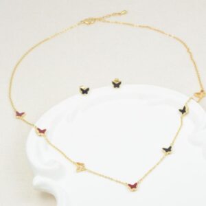 juego de collar con aretes de mariposas